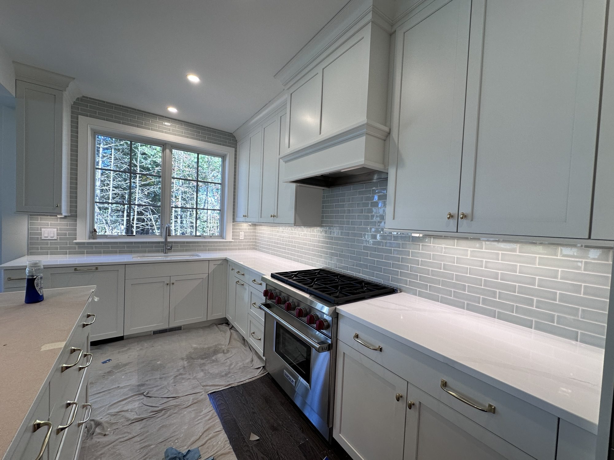 Backsplash tile installation in Newton, MA — finished backsplash behind range area