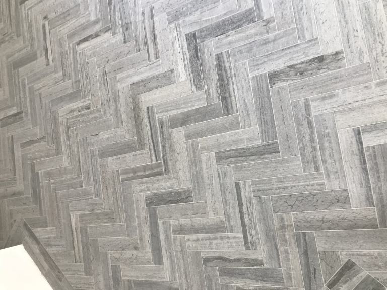 Tiling Bathroom Floor - Herringbone Limestone