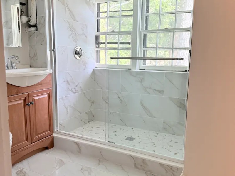 Custom Tile Shower Remodel With Window, Before and After
