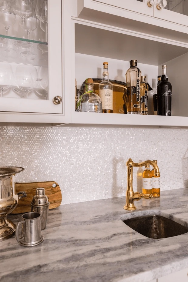 Elegant mother-of-pearl backsplash installed by Davie Mac Tile, reflecting luxury and expert craftsmanship.