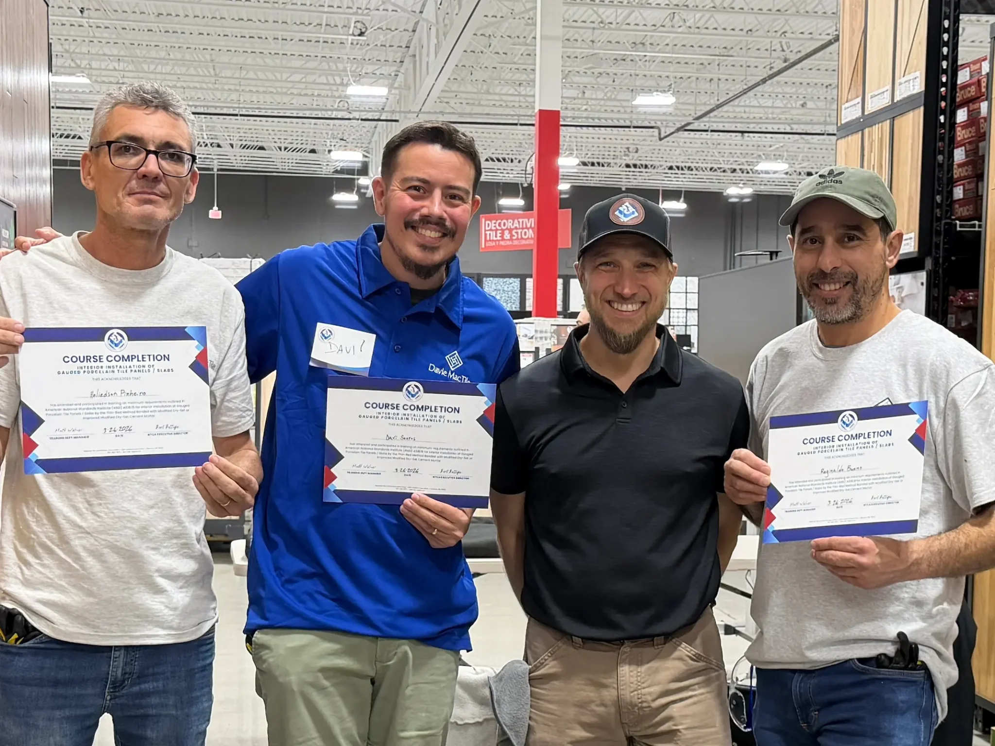 Davi Santos of Davie Mac Tile and crew with NTCA trainer after completing gauged porcelain panel installation course, March 2026