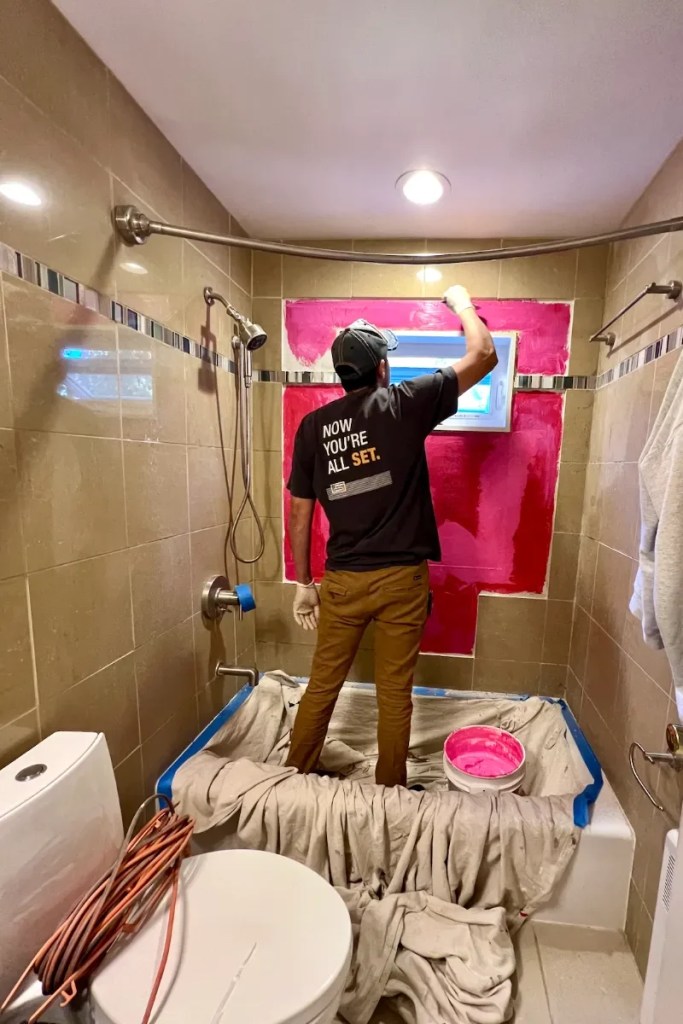 Tile repair and waterproofing preparation by a professional from Davie Mac Tile.